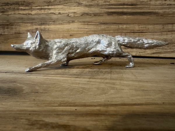 Crouching hunting fox