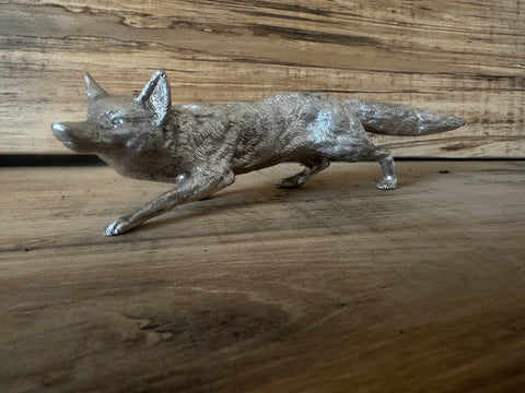 Crouching hunting fox