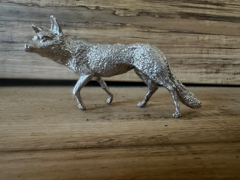 Silver fox stalking