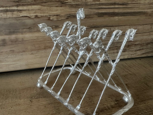 Horse head and whip toast rack