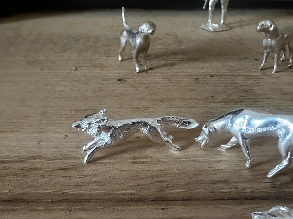Small running fox and hounds