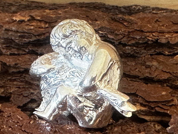 Silver plated goose boy paper weight